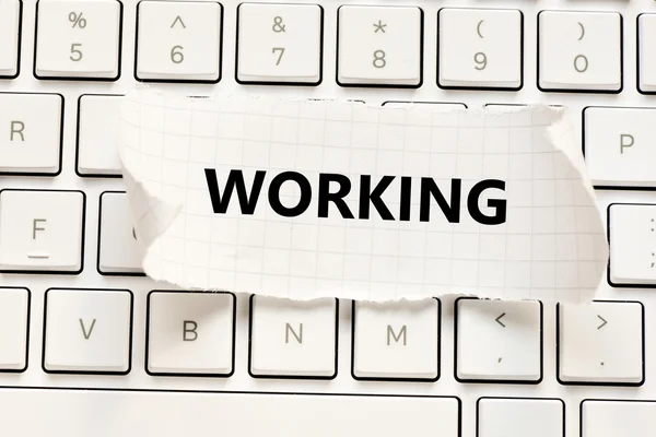 Computer keyboard with working inscription — Stock Photo, Image