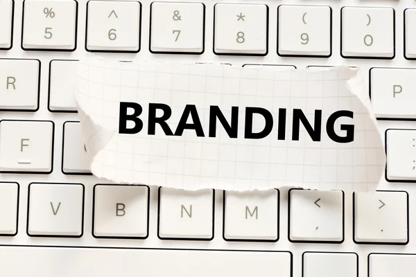 Tastiera con iscrizione di branding — Foto Stock