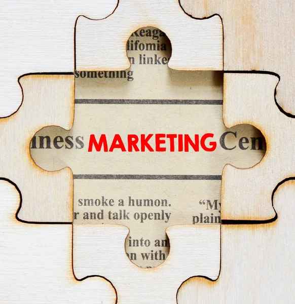 Jigsaw puzzle with lettering marketing — Stock Photo, Image