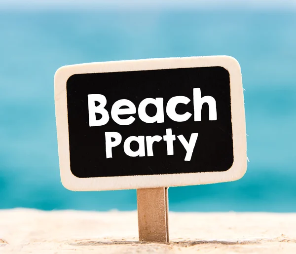 beach party text on blackboard