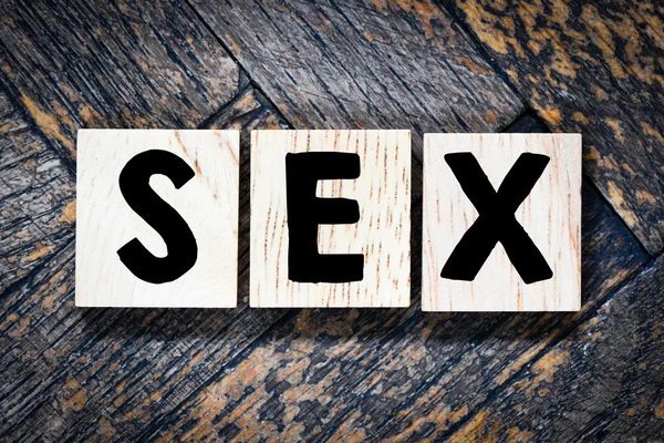 Lettres en bois orthographe SEX — Photo