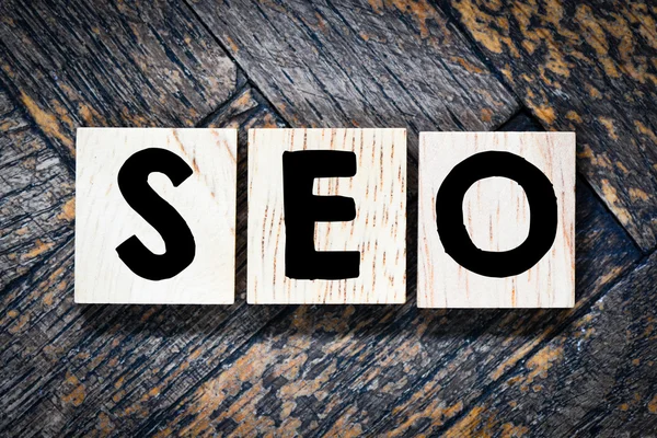 Wooden letters spelling SEO — Stock Photo, Image
