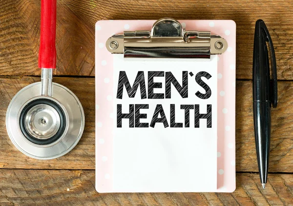 Clipboard with men's health inscription — Stock Photo, Image