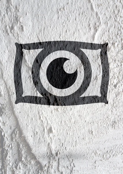 Дизайн иконки глаза на фоне текстуры стен цемента — стоковое фото