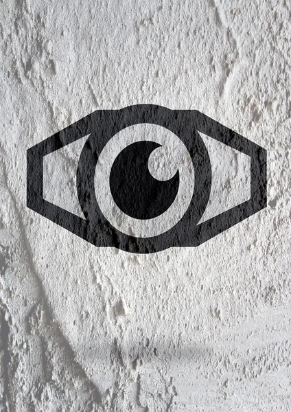 Eye icon character design on Cement wall texture background — Stock Photo, Image