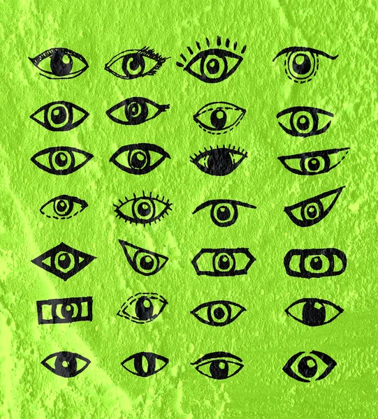 Eye icon character design on Cement wall texture background — Stock Photo, Image