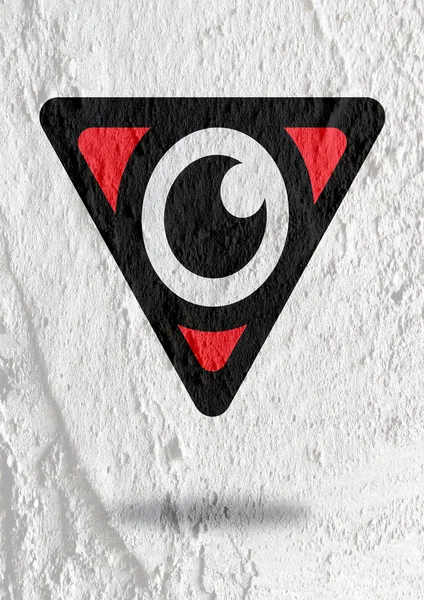 Oko ikona postać projekt na cementowe ściany tekstura tło — Zdjęcie stockowe