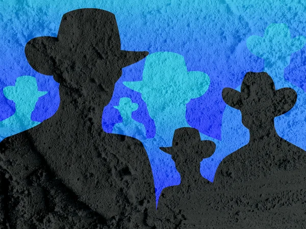Ковбойские люди силуэт на цементной стене текстуры фона desi — стоковое фото