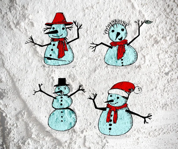 Снеговик на стене цемента — стоковое фото