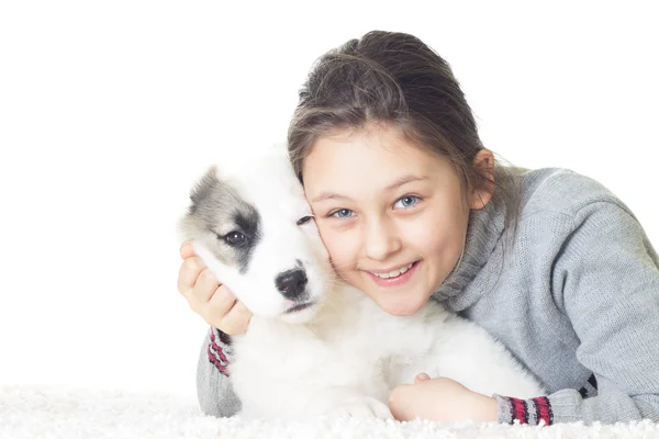 Little girl and puppy — Stock Photo, Image
