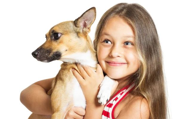 Dziewczynka trzyma psa na rękach — Zdjęcie stockowe