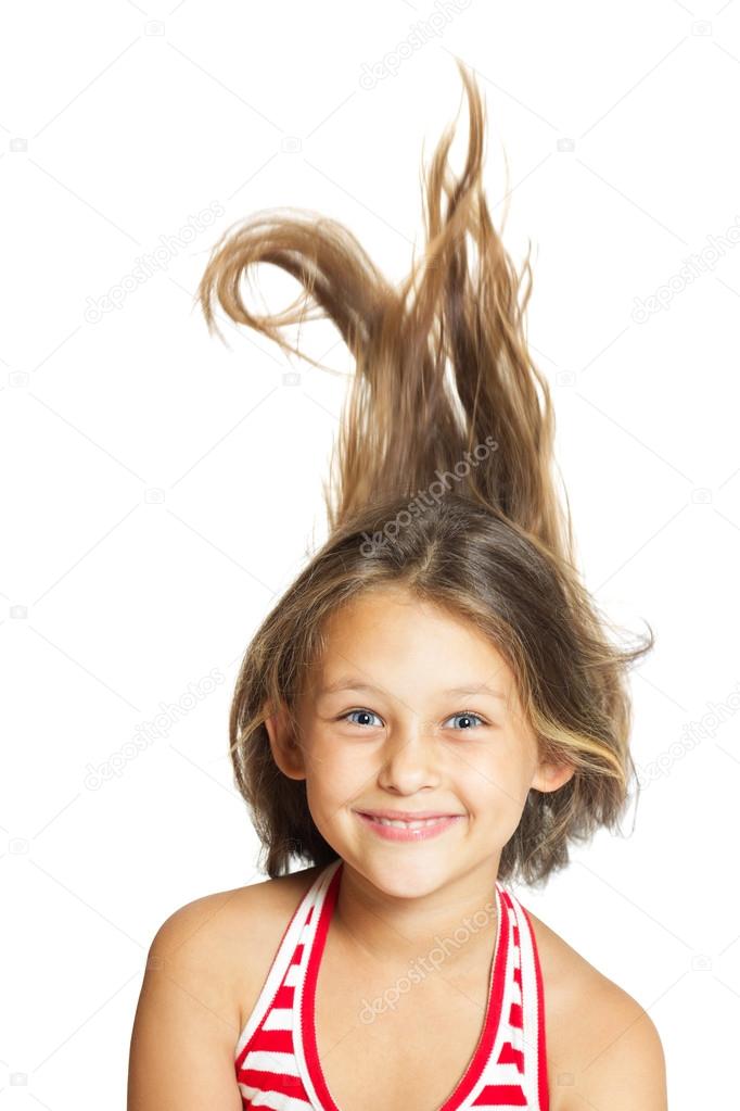 cheerful little girl with funny hair flying