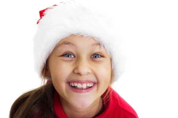 Portret van een glimlachende vrij klein meisje in een GLB van Santa Claus — Stockfoto