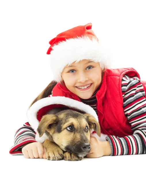 Happy kid in Christmas hat and puppy on a white background isola — Stock Photo, Image