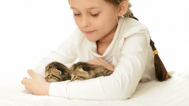 Girl lying  with two   kittens — Stock Video