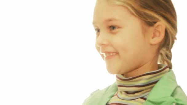 Happy little girl playing darts — Stock Video