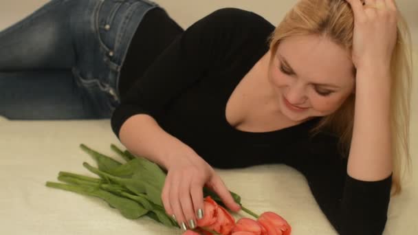 Girl with tulips — Stock Video