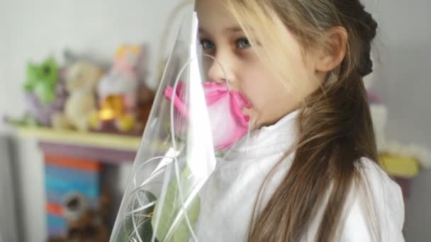 Little girl with rose — Stock Video