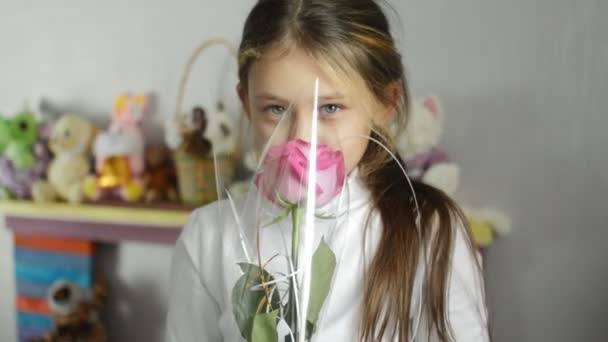 Little girl with rose — Stock Video