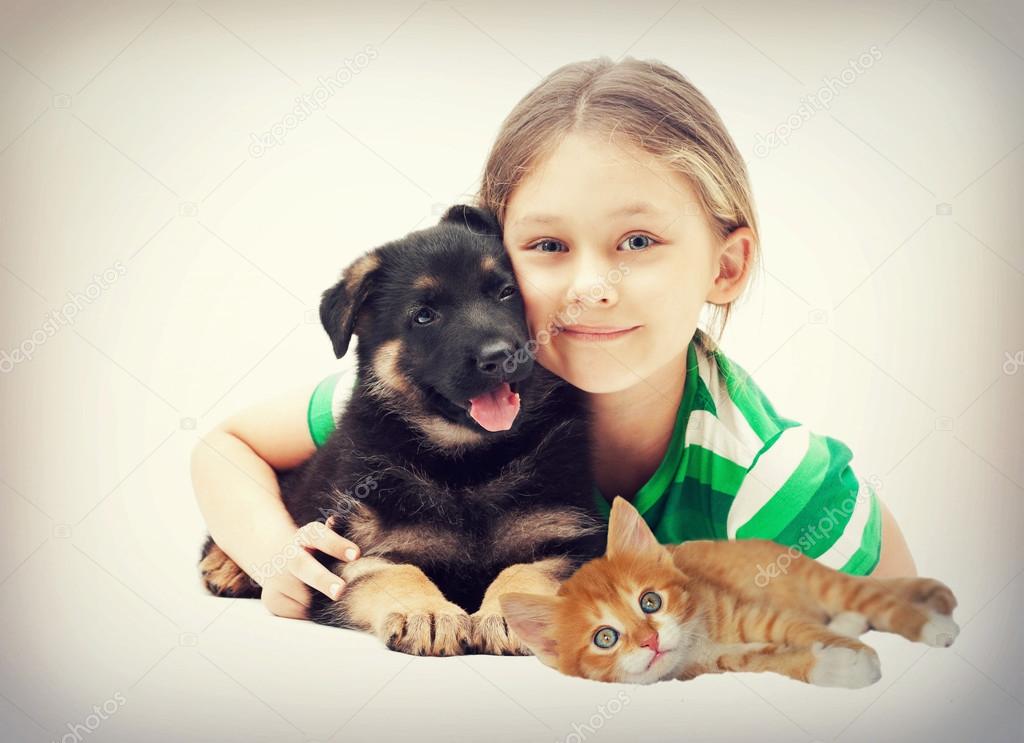 Child and puppy and kitten