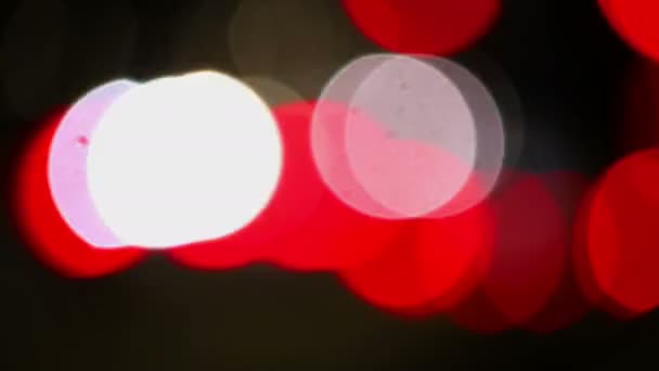 Abstrakt natt trafikerar Bokeh bakgrund med Defocused lampor. — Stockvideo