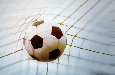 Futbol topu bir hedef haline tekme attı.