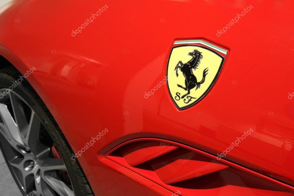 Ferrari Horse Logo Close Up on Red Car