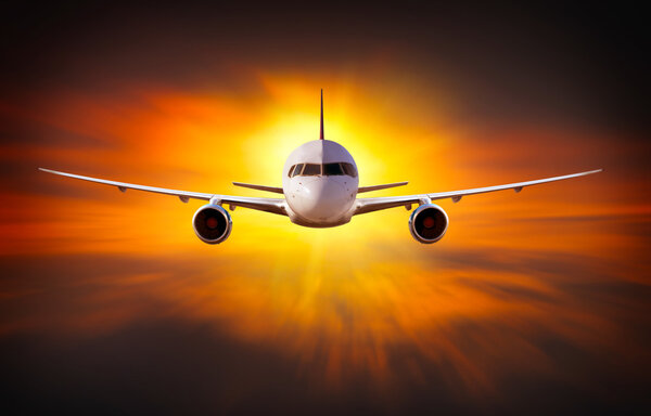 Airplane above the clouds