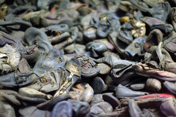 Pilee of shoes, kept by the Nazis after murdering their victims 