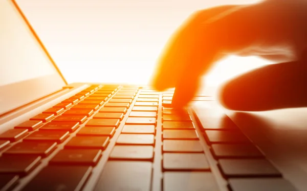 Typing on laptop keyboard. — Stock Photo, Image