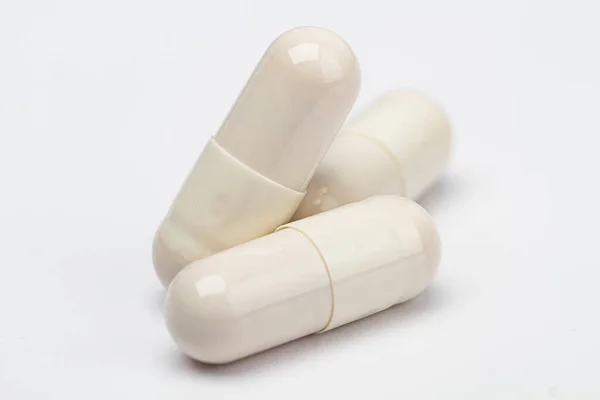 Three White Pills White Background Stack Top One Another — Stock Photo, Image