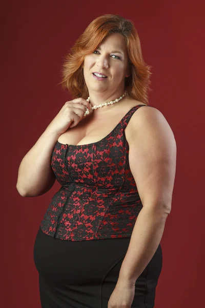 Overweight woman in corset — Stock Photo, Image