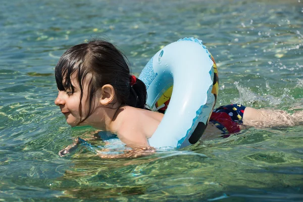 Child with floating ring