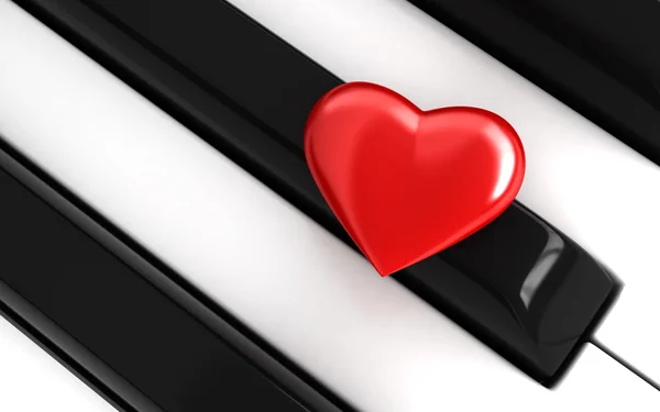 Corazón rojo sobre teclas de piano —  Fotos de Stock