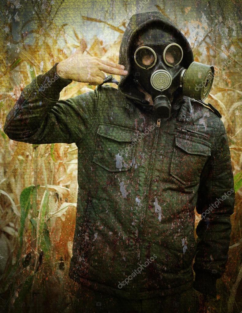 Man gas mask gun concept the danger of war — Stock Photo © strelov
