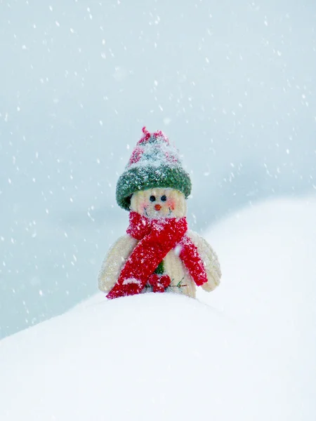 Merry Christmas postcard with a snowman in the snow — Stock Photo, Image