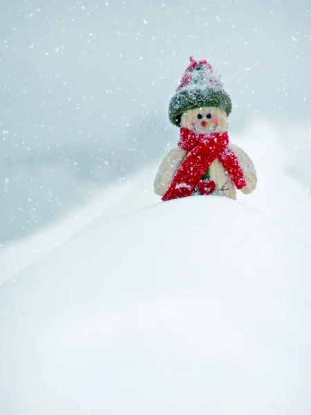 Merry Christmas postcard with a snowman in the snow — Stock Photo, Image