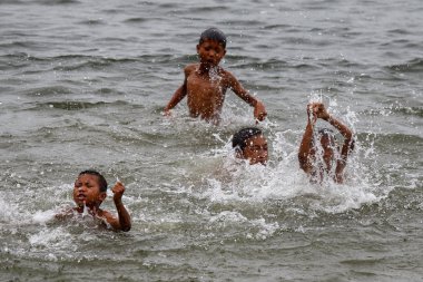 Children Play in Rhi Lake, Myanmar
