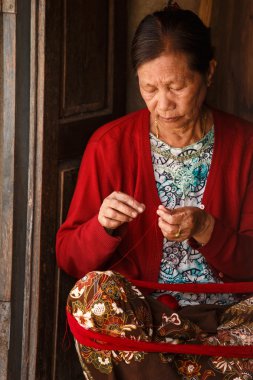 Woman Making Handicrafts in Falam, Myanmar