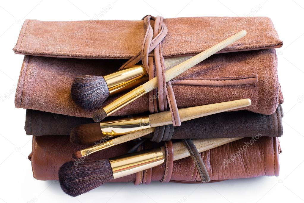Makeup Brushes in a colored leather coveres
