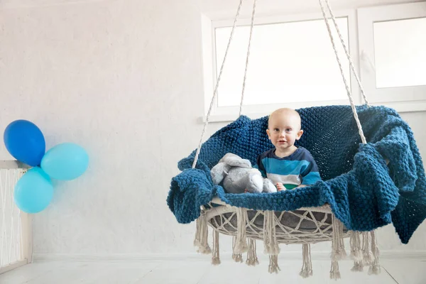Little Boy Soft Toy Sits Hanging Chair Balloons First Birthday — Stock Photo, Image