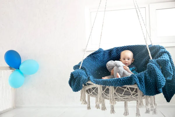 Little Boy Soft Toy Sits Hanging Chair Balloons First Birthday — Stock Photo, Image