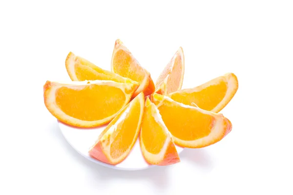 Sliced orange on a plate — Stock Photo, Image