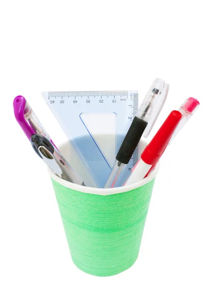 Vidrio verde con bolígrafos y triángulo — Foto de Stock
