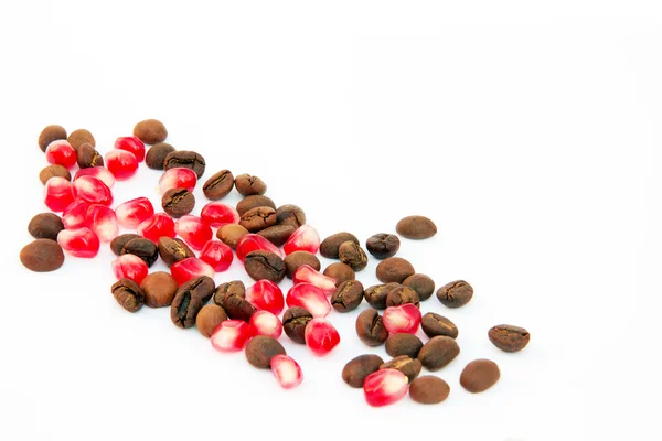 Coffee grains and  red pomegranate grains — Stock Photo, Image