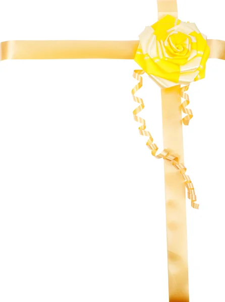 Yellow bow with yellow ribbon as a decoration for a gift — Stock Photo, Image