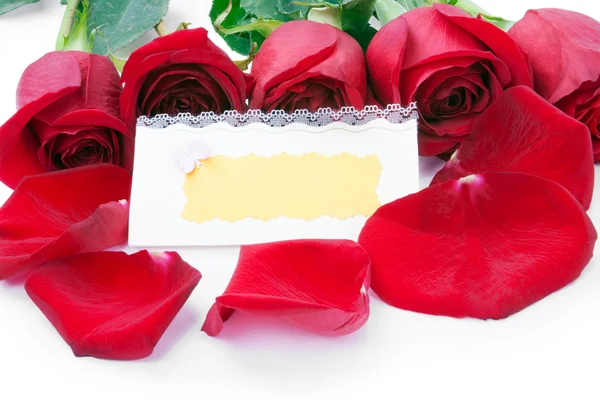 Boş hediye kartı ile kırmızı gül — Stok fotoğraf