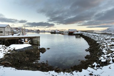 Small fishing harbor on Lofoten Islands in winter time clipart