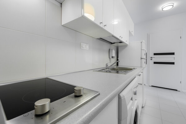 Small and compact kitchen in white