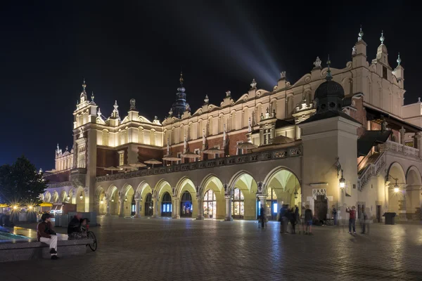 Pano hall (polonês: Sukiennice) em Cracóvia — Fotografia de Stock